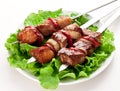Grilled kebab (shashlik) on spits. Royalty Free Stock Photo