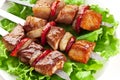 Grilled kebab (shashlik) on spits. Royalty Free Stock Photo