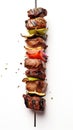 grilled Kebab on skewers with peppers and onions on a white background, created by Generative AI