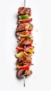 grilled Kebab on skewers with peppers and onions on a white background, created by Generative AI