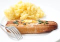 Grilled kipper and mashed potato and fork Royalty Free Stock Photo