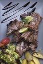 Grilled lamb chops with baked potatoes 3top view Royalty Free Stock Photo