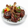 Grilled Lamb Chops Garnished with Herbs and Vegetables on White Plate Royalty Free Stock Photo