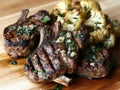 Grilled Lamb Chops with Roasted Cauliflower and Herbs Royalty Free Stock Photo