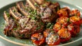 Grilled lamb chops with roasted tomatoes and fresh herbs Royalty Free Stock Photo