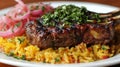 Grilled Lamb Chops with Saffron Rice and Red Onions Royalty Free Stock Photo