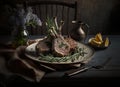 Grilled lamb chops served with rosemary and lemons in rustic dish, juicy dish Royalty Free Stock Photo