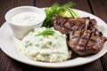 grilled lamb chops served with a side of mashed potatoes Royalty Free Stock Photo