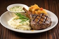 grilled lamb chops served with a side of mashed potatoes Royalty Free Stock Photo