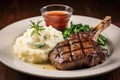 grilled lamb chops served with a side of mashed potatoes Royalty Free Stock Photo