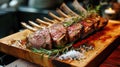 Grilled lamb chops on wooden cutting board