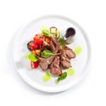 Grilled Lamb Rack with Baked Vegetables on White Restaurant Plate Top View Royalty Free Stock Photo