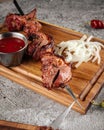 Grilled lamb shashlik with red sauce Royalty Free Stock Photo