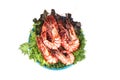 Grilled large fresh prawns served with megetables on blue plate