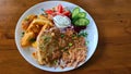 Grilled large piece of pork meat with potatoes and fresh vegetable salad Royalty Free Stock Photo