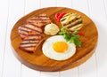 Grilled Leberkase with fried egg and mustard Royalty Free Stock Photo