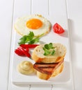 Grilled Leberkase sandwich with mustard and fried egg Royalty Free Stock Photo