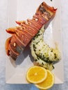 Grilled lobster tail with lemon Royalty Free Stock Photo