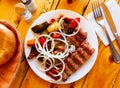 Grilled lula kebab - meat dish, with vegetable and onion. Popular oriental dish closeup Royalty Free Stock Photo