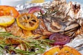 Grilled mackerel fish in foil with vegetables Royalty Free Stock Photo