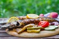 Grilled mackerel fish on the wooden tray