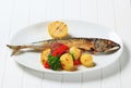 Grilled mackerel and potatoes Royalty Free Stock Photo