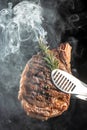 grilled marbled beef steak striploin with spices in a grill pan. place for text, top view Royalty Free Stock Photo