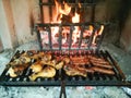 Grilled meat on fireplace Royalty Free Stock Photo