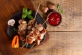 Grilled meat (kebab) with vegetables and sauce Royalty Free Stock Photo