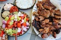 Grilled meat and salads