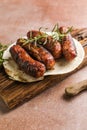 Grilled meat sausages. Fried sausage. Grilling food, bbq, barbecue. place for text, top view Royalty Free Stock Photo