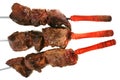 Grilled meat on skewer with tomatoes