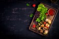 Grilled meat skewers, chicken shish kebab with zucchini, tomatoes and red onions. Royalty Free Stock Photo