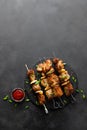 Grilled meat skewers, shish kebab on black background Royalty Free Stock Photo