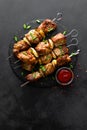 Grilled meat skewers, shish kebab on black background Royalty Free Stock Photo