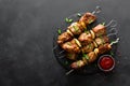 Grilled meat skewers, shish kebab on black background Royalty Free Stock Photo