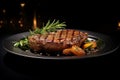 Grilled meat steak on plate in black background with copy space Royalty Free Stock Photo