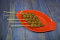 Grilled meatballs (bakso bakar), traditional food from East Java, Indonesia Delicious Indonesian street food.