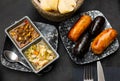Grilled morcilla and chorizo sausages with vegetable salads