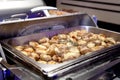 Grilled Mushrooms In Bain-Marie Tray Royalty Free Stock Photo