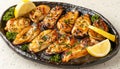 Grilled mussels on black plate traditional mediterranean dish, authentic cuisine