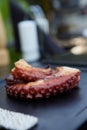 Grilled octopus, octopus, sun dried octopus, tentacles, charcoal grilled, seafood, Greek food, traditional, sea food Royalty Free Stock Photo