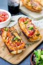 Grilled open faced sandwich with tomato, olives, cheese and chic Royalty Free Stock Photo