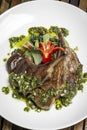 Grilled organic lamb chops meal with chimichurri sauce in argentina Royalty Free Stock Photo