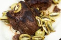 Grilled ostrich steak with kiwi berries