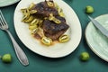 Grilled ostrich steak with kiwi berries