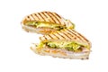 Grilled panini with Prosciutto ham, salad and cheese Isolated, white background.