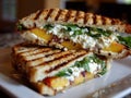 Grilled peach and goat cheese sandwich on rye bread with fresh spinach Royalty Free Stock Photo