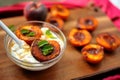 Grilled peaches and Greek yoghurt for a healthy alkaline breakfast Royalty Free Stock Photo