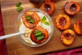 Grilled fresh peaches and Greek yoghurt for a healthy alkaline breakfast Royalty Free Stock Photo